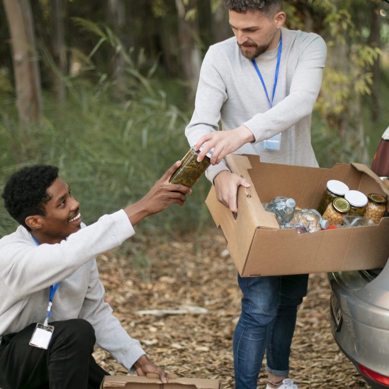 full-shot-volunteers-with-donations